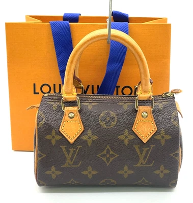 Auténtico bolso de mano Louis Vuitton monograma mini rápido M41534 con bolsa de papel NS111553 Foto 1 de 4