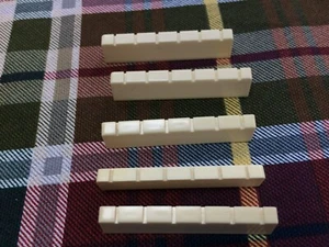 Luthier's Lot of Cream Nylon/Classical Guitar Plastic Slotted Nuts ~2" - Picture 1 of 2