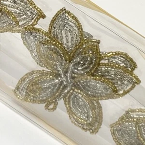 Perlen Blume Serviettenringe Set/4 • Silber & Gold • Aman Imports Indien - Bild 1 von 3
