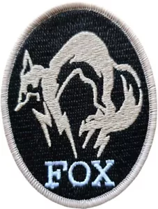 METAL GEAR SOLID FOX BLACK & DESERT PS4 BÜGELBILD TACTICAL MORALE PATCH SPIEL - Bild 1 von 2