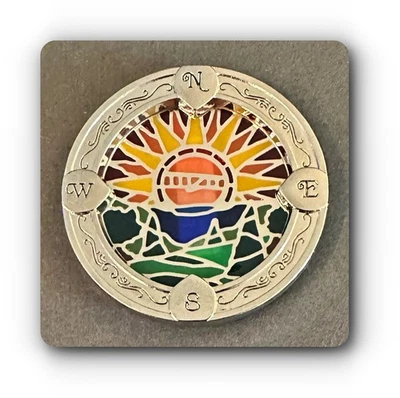 Sunrise Over the Forest - Painted Glass Mosiac Geocoin with Compass Points  - Image 1 of 2