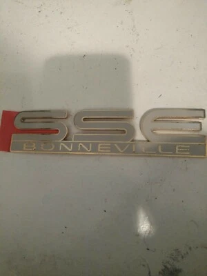 1994-1995 Pontiac Bonneville SSE Door Emblem Nameplate   LIGHT GRAY & GOLD - Image 1 of 2