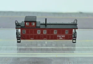 Caboose Marklin T&NO Texas y Nueva Orleans carcasa vacía rojo escala Z (Z6474) - Imagen 1 de 3