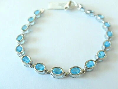 *NUEVO CON ETIQUETAS* BRAZALETE TENIS TOPACIO AZUL OVALADO ORO BLANCO 14K 8,50 CT 7,25" - 8,2 gms Foto 1 de 4