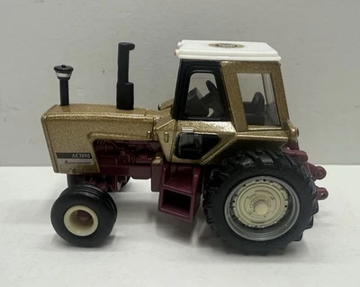 1/64 ERTL Allis Chalmers 7050 Tractor GOLD CHASE - Image 1 of 4