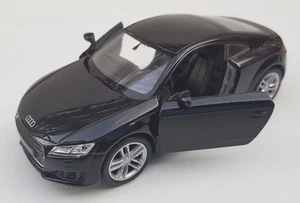 ENVÍO RÁPIDO AUDI TT Coupe 2014 negro / black Welly modelo coche 1:34 NUEVO EMBALAJE ORIGINAL - Imagen 1 de 1