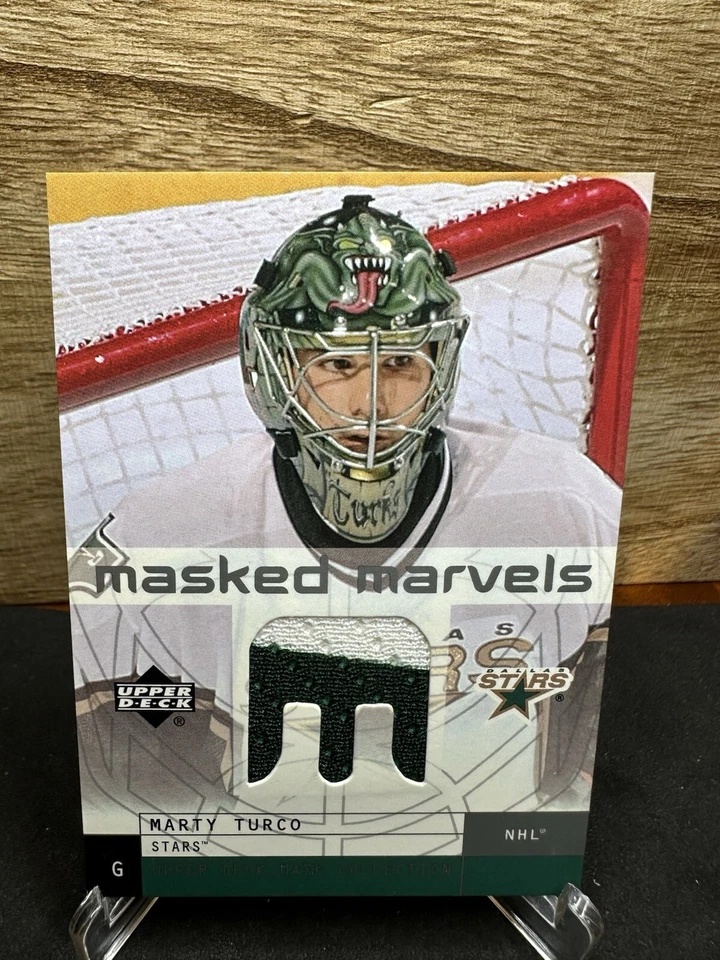 2002-03 Upper Deck Mask Collection Marvels Jerseys Marty Turco #MM-MT 2 COLOR - Image 1 of 2