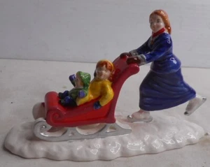 "Skate Faster...Mom!" 51705 Snow Village Department Dept. 56 Christmas Figurine - Picture 1 of 6