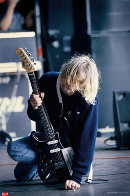 Nirvana - Music Poster (Kurt Cobain Kneeling Live On Stage) (Size: 24" X 36")