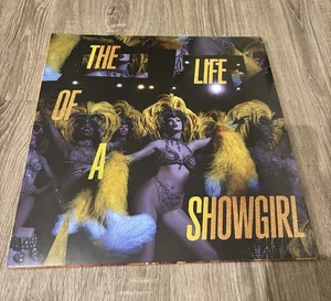 Taylor Swift The Life Of A Showgirl: Baby That’s Show Business - Golden Vinyl - Imagen 1 de 2