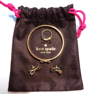 KATE SPADE NEW YORK Signed, Gold Tone, Bow Bangle Bracelet, Ring and Stud Earrin - Picture 1 of 4
