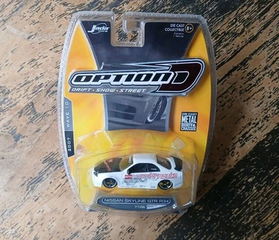 Jada Importación Nissan Skyline GT-R R34 Opción D Blanco 1:64  Foto 1 de 4