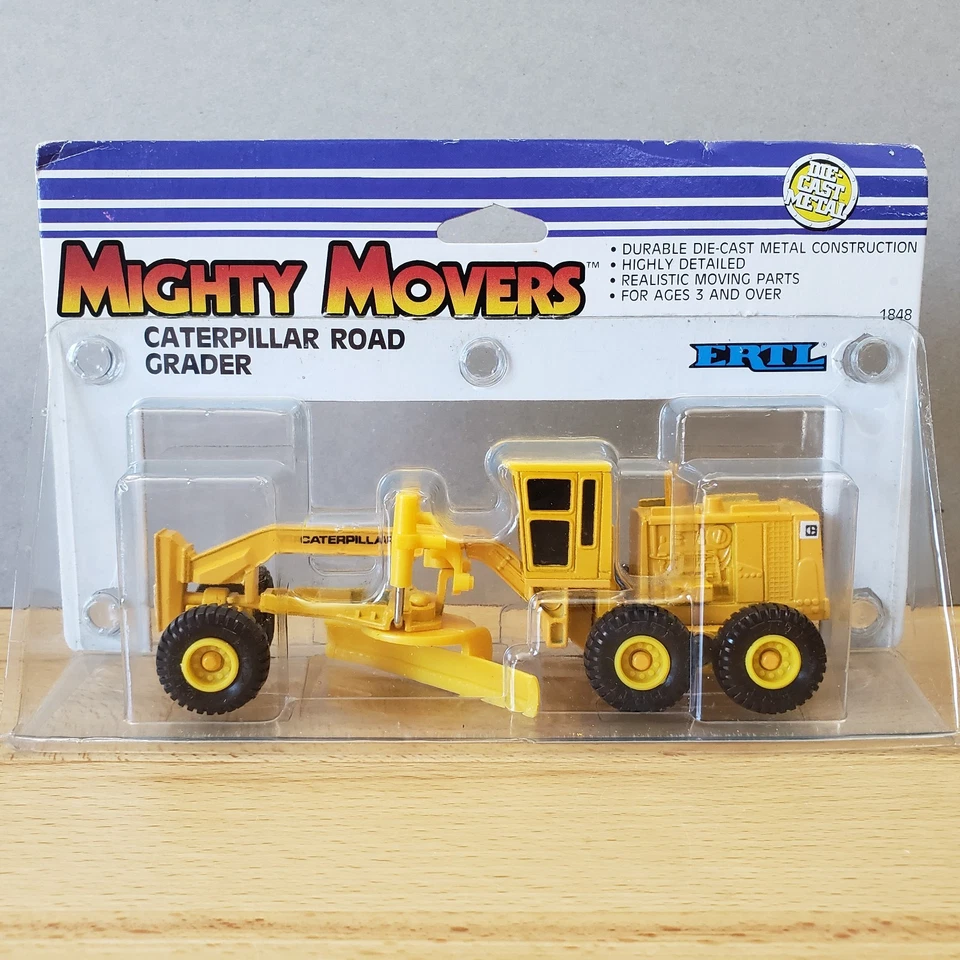 Niveladora de carretera Ertl CAT Caterpillar Mighty Movers diecast Foto 1 de 4