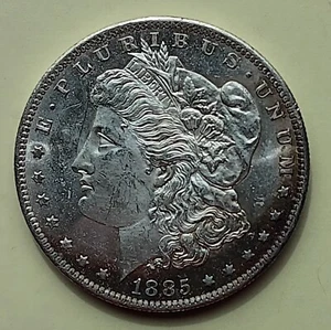 1885 O  $1 MORGAN DOLLAR 90% SILVER - Picture 1 of 3