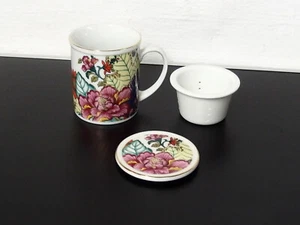 Teetasse mit Sieb und Deckel aus Porzellan - Bild 1 von 13