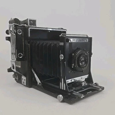 Lente Graflex Speed Graphic 4x5 127mm f4.7 com estojo e 8 suportes de filme e Polaroid Bk. - Imagem 1 de 4
