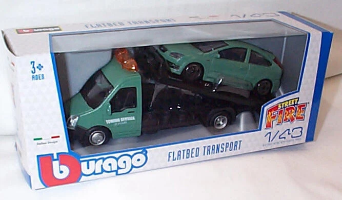 Transportador de coche de plataforma plana + Ford Focus en verde escala 1:43 burago nuevo en caja Foto 1 de 1