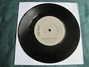 NEW MUSIK - THIS WORLD OF WATER - 7" 45 rpm vinyl record - Picture 1 of 1
