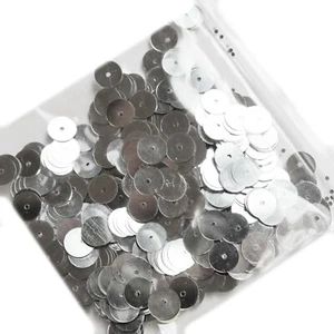 Separación de lentejuelas de 8 mm plata redonda pk/500 (agujeros fuera del centro) - Imagen 1 de 2