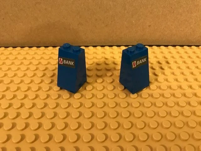 Lego Spiderman 2x2x3 blue sloped column with "NBANK" sticker x2 - Image 1 of 1