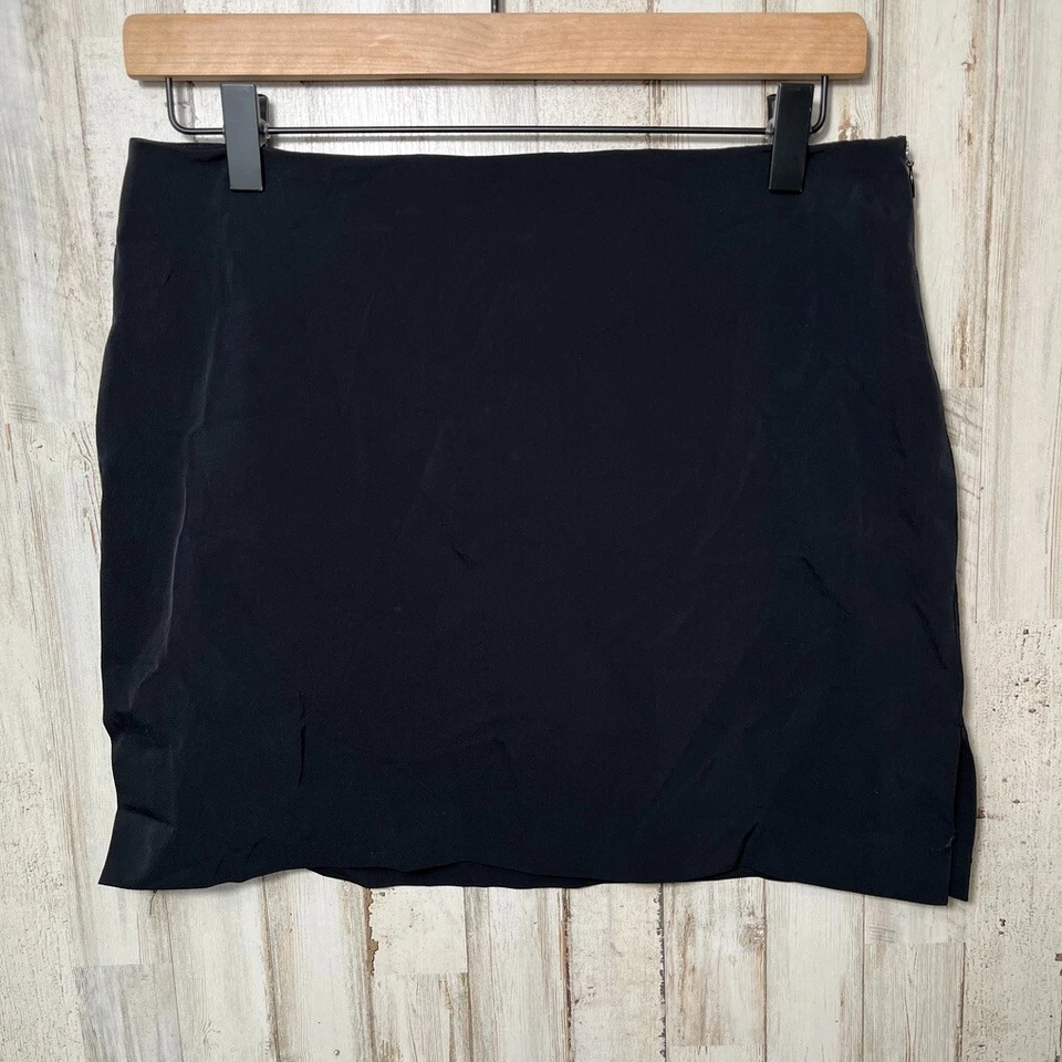 Minifalda elástica Guess vintage años 90 negra línea A hecha en EE. UU. para mujer talla 4 Foto 1 de 4