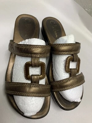 Sandalias Nike Air de cuero con plataforma deslizable y cuña doradas. Talla 7 1/2. Foto 1 de 4