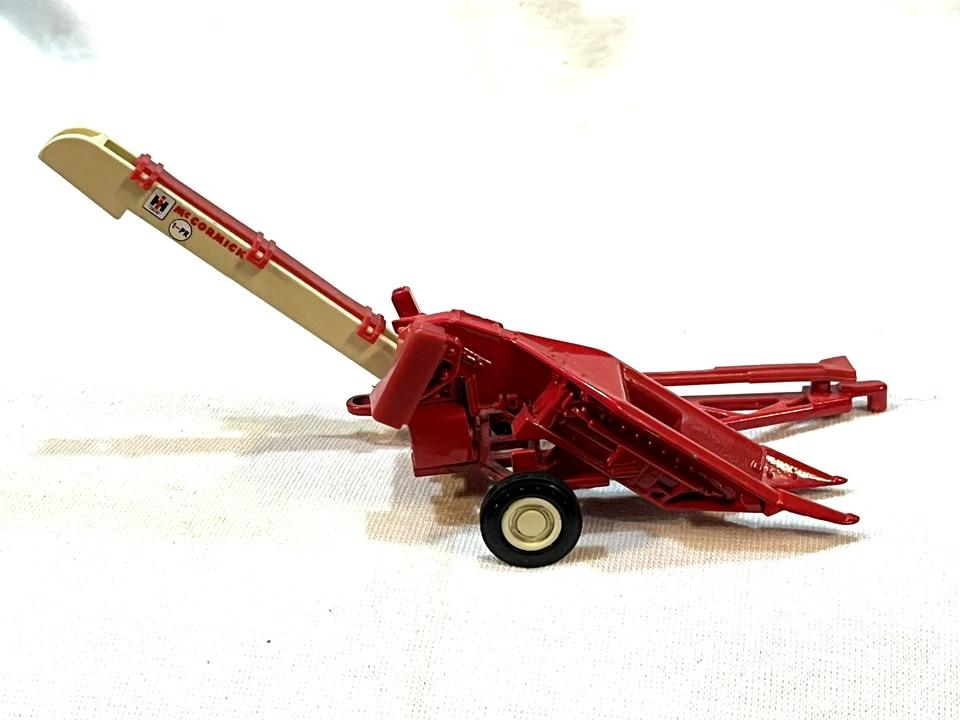 ERTL 1/43 MCCORMICK  1 - PR Corn Picker Farm Toy - Image 1 of 4