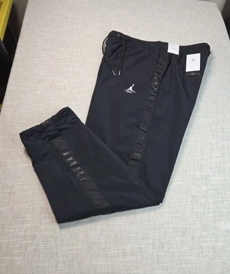 NIKE Air Jordan Essentials Pantalones Grandes Altos Para Hombre Negro Blanco Tejido Repeler Calentamiento Foto 1 de 4