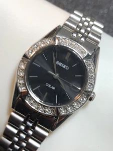 Seiko Solar Ladies Watch Silver Tone Black Dial Gemmed Bezel Women’s Stainless - Picture 1 of 23