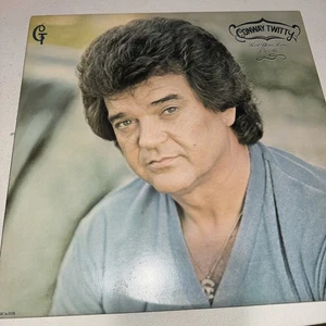 CONWAY TWITTY*REST YOUR LOVE ON ME*VINYL LP RECORD MCA-5138(MCA-37228)  - Picture 1 of 3