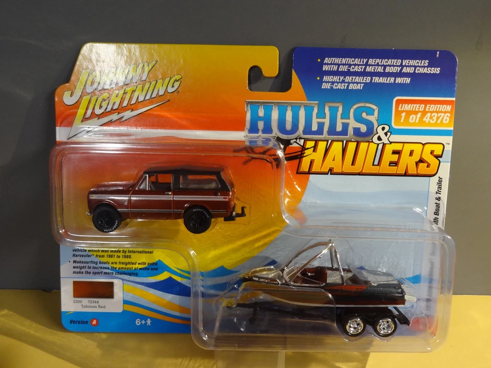 JOHNNY LIGHTNING - RED - 1979 INTERNATIONAL SCOUT WITH MALIBU BOAT & TRAILER - Image 1 of 1