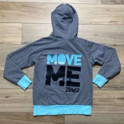 Sudadera con capucha de mujer Zumba Move Me manga larga talla mediana gris turquesa Foto 1 de 4