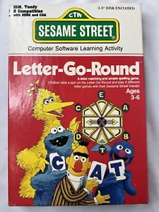 Sesame Street Letter-Go-Round IBM Tandy software di gioco per computer con scatola e disco - Foto 1 di 7
