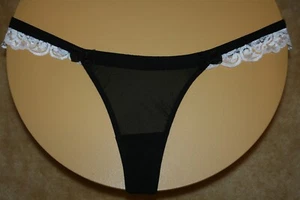 Tanga negra transparente con falda de encaje floral blanca brillante a lo largo de la banda y 2 lazos - 4 - Imagen 1 de 2