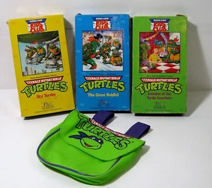 Vintage 1990 Teenage Mutant Ninja Turtles TMNT Lot of 3 VHS & Fanny Pack - Imagen 1 de 5