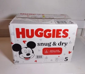 Huggies Snug & Dry Babywindeln, Größe 5 (27+ lbs), 68 Ct - Bild 1 von 10