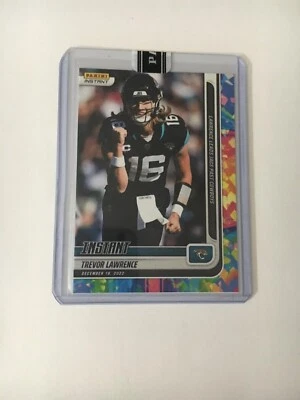 2022 PANINI INSTANT #153 TREVOR LAWRENCE  LEADS JAGS PAST COWBOYS VERSICOLOR 4/5 - Image 1 of 2