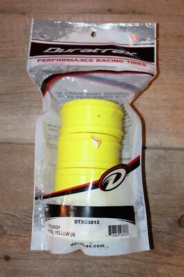 DURATRAX DTXC3813 1/8 BUGGY WHEELS YELLOW (4) R/C MODEL VEHICLE PARTS - NEW - Image 1 of 2