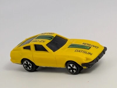 Coche de juguete Kidco Datsun 280-ZX amarillo Burnin' Key variación de rueda magnética de colección de los años 80 Foto 1 de 4