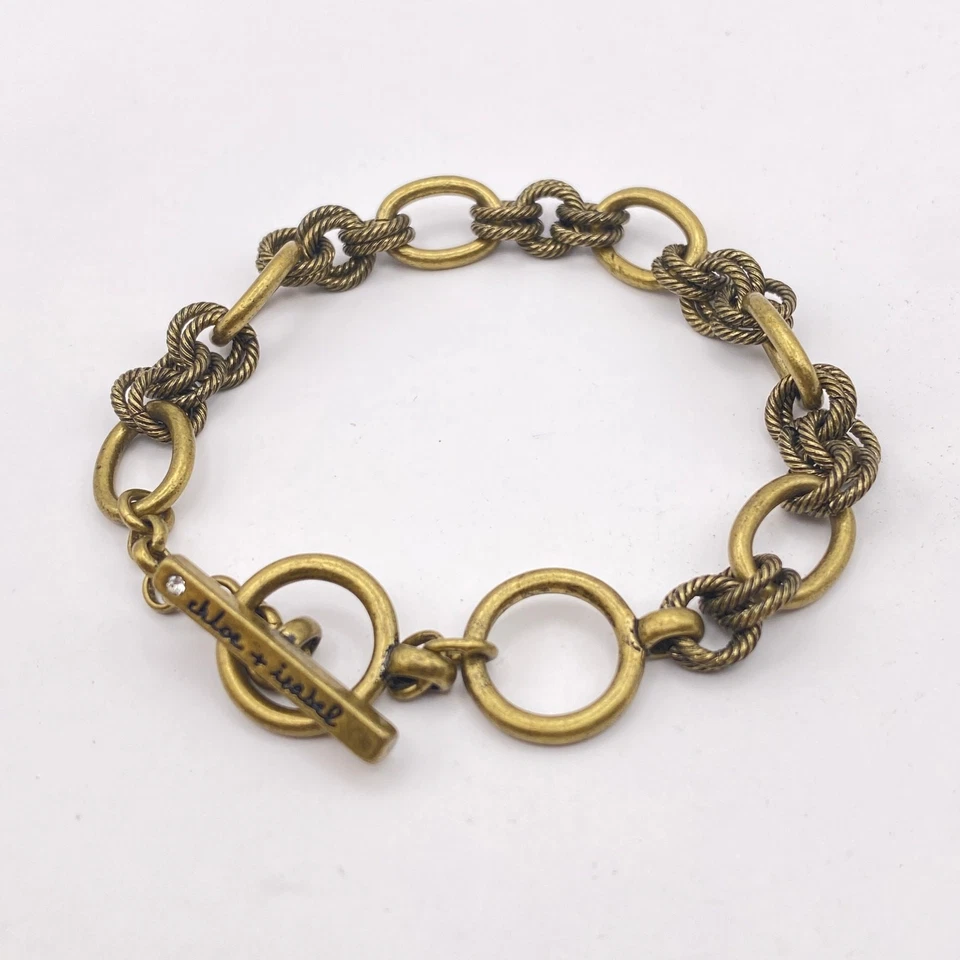 CHLOE + ISABEL Antiguo Brazalete de Cadena Tono Dorado Cierre de Palanca Dijes Audaz Grueso Foto 1 de 4
