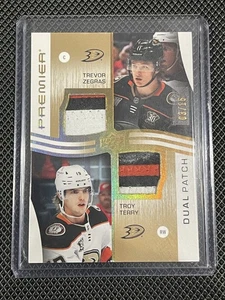 Trevor Zegras / Mason McTavish - 2023-24 Upper Deck Premier Dual Patch /15 Ducks - Picture 1 of 2