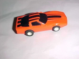 COCHE RANURA VINTAGE - CORBETA 1983 - ROJO NEGRO FLUORESCENTE - Imagen 1 de 3