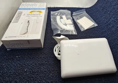 Elegante corrector universal de toma y enchufe 3-M-OVSZ-W con corrector de cable de 3 pies Foto 1 de 4