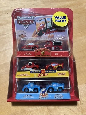Disney Pixar World of Cars Value Pack  DOC HUDSON,RED,DINOCO MCQUEEN, CHICKHICKS - Image 1 of 2