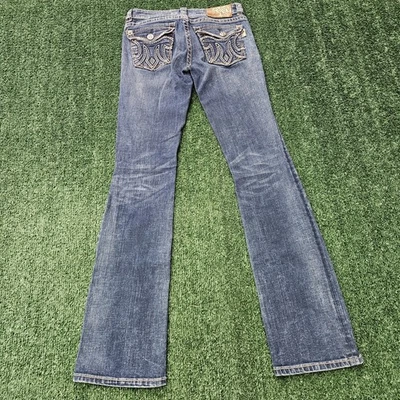 Pantalones de mezclilla para mujer MEK DNM 27 cintura Lucknow ajustados corte bota adornado solapa bolsillo Foto 1 de 4