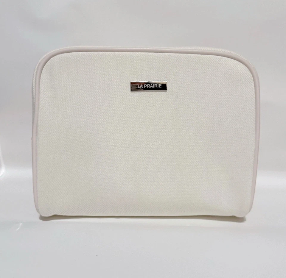 全新 La Prairie 白色化妆品化妆拉链手拿包 旅行袋 — 第 1/1 张图片