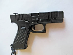 Pistola a mano * Portachiavi ** { Caricatore automatico / Nero } ** Spedizione gratuita - Foto 1 di 6