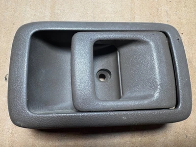 Manija de puerta interior lateral derecho Toyota 4Runner 1998-2002 marrón OEM Foto 1 de 2