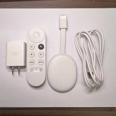 Google Chromecast with Google TV 4K - Snow. - Image 1 of 4