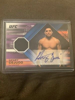 Henry Cejudo Knockout 2019, Signed Jersey Card #/25 - Image 1 of 2